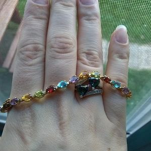 14k gold , authentic gemstone tennis bracelet